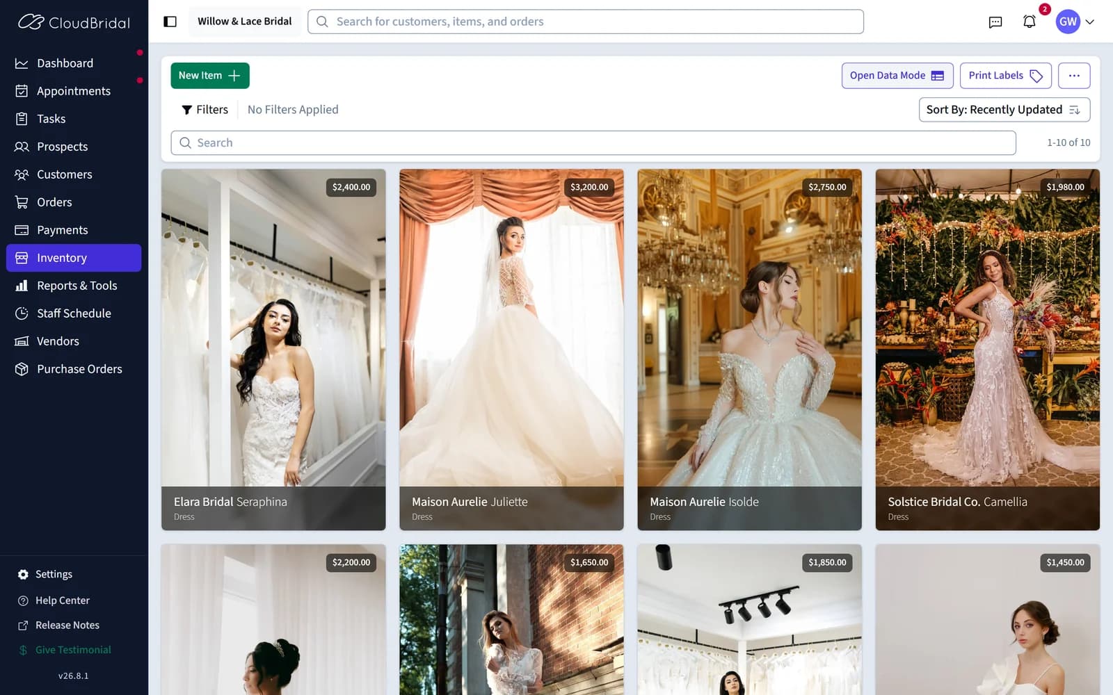The staff inventory screen showing the same gowns with photography, designers and prices