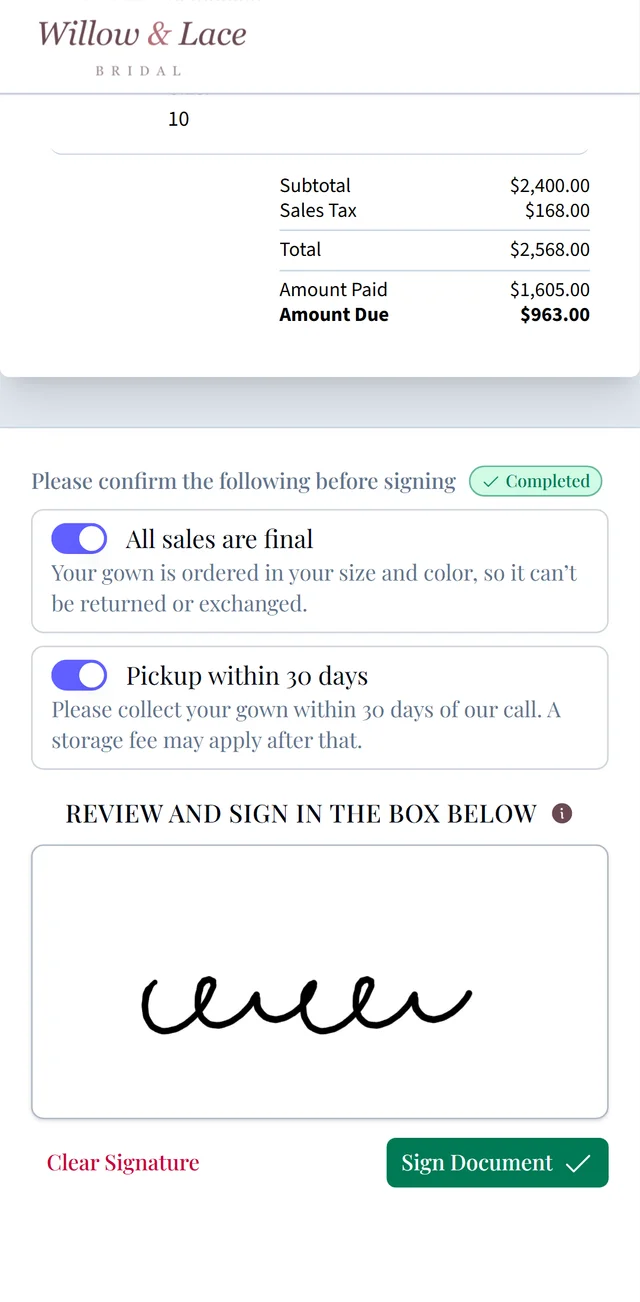 Signing a sales agreement on her phone: both required terms confirmed and her signature drawn